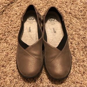 Metallic brown Clark’s Cloudsteppers slip on